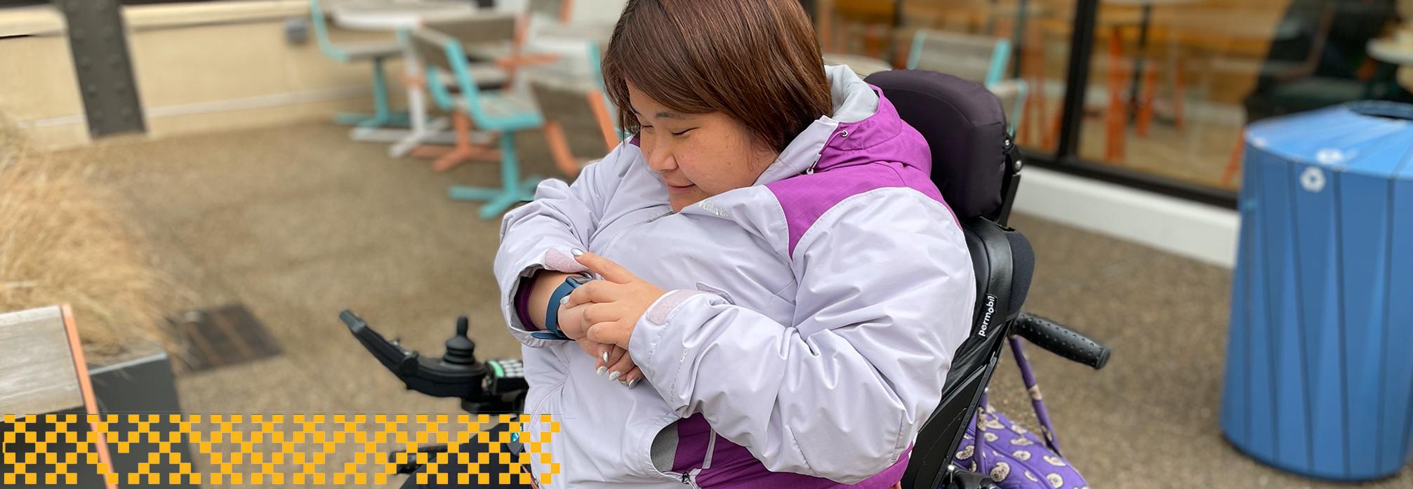 A person interacting with a Smart Watch